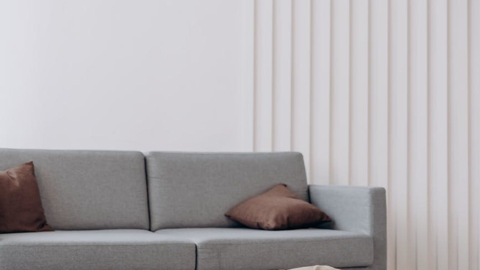 A calm and spacious room with yoga mats, suggesting a peaceful atmosphere for practice.